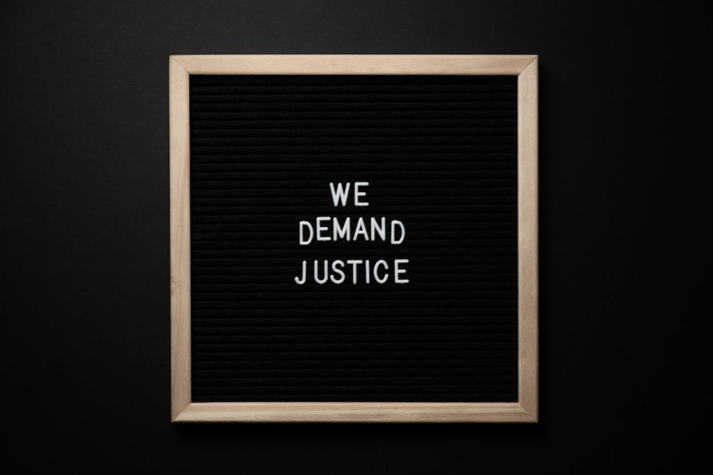 We demand justice inscription in frame