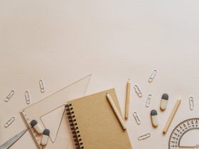 Spiral Notebook Pencils and Paper Clips Flatlay