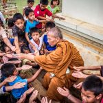 Monk Surrounded by Children