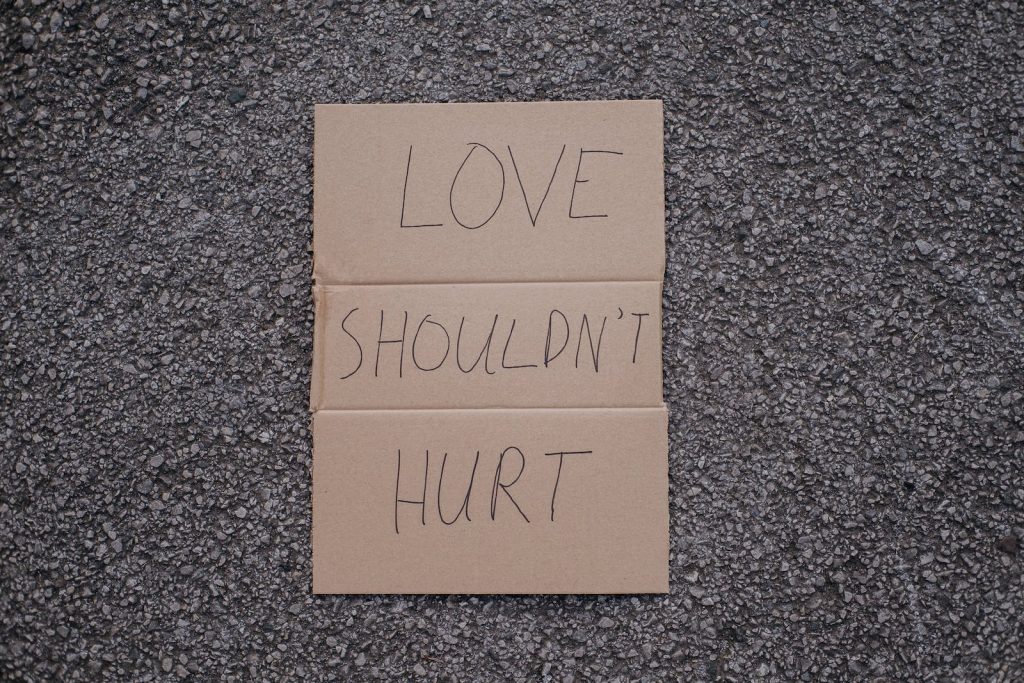 Inscription on carton love should not hurt