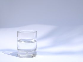 clear drinking glass filled with water